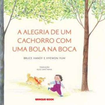 Imagem de A ALEGRIA DE UM CACHORRO COM UMA BOLA NA BOCA